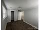 This bedroom features hard-wood floors, a window, and a closet at 424 20Th Ne Ave, Hickory, NC 28601