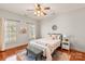 This beautiful bedroom has lots of natural light and hardwood floors at 425 Gladelynn Way, Waxhaw, NC 28173