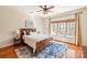 This bedroom has an accent rug and lots of natural light at 425 Gladelynn Way, Waxhaw, NC 28173