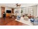 Spacious living room with a large window, hardwood floors, and modern decor at 425 Gladelynn Way, Waxhaw, NC 28173