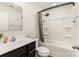 Cozy bathroom featuring a tub and shower, and a single sink vanity providing essential functionality at 4255 Wild Ridge Dr, Charlotte, NC 28215