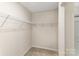 This closet has wire rack shelving with neutral walls and carpet at 4255 Wild Ridge Dr, Charlotte, NC 28215