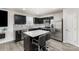 Kitchen with granite countertops, stainless steel appliances, and breakfast bar at 4255 Wild Ridge Dr, Charlotte, NC 28215