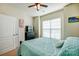 Bright bedroom with a large window, TV, door, soft carpet and a bed at 427 Kentmere Ln, Lake Wylie, SC 29710