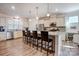 Well-appointed kitchen boasts stainless appliances, ample counter space, and barstool seating at 427 Kentmere Ln, Lake Wylie, SC 29710