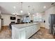 Large kitchen island in an open-concept floorplan, connecting to the living room at 427 Kentmere Ln, Lake Wylie, SC 29710