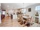 Open-concept kitchen and dining area featuring modern appliances and light wood floors at 427 Kentmere Ln, Lake Wylie, SC 29710