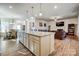 Spacious kitchen island enhances this open-concept floor plan with the living room nearby at 427 Kentmere Ln, Lake Wylie, SC 29710