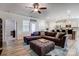 Living room seamlessly connects to the adjacent kitchen, creating an open and airy atmosphere at 427 Kentmere Ln, Lake Wylie, SC 29710