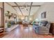 Cozy living room featuring a fireplace, vaulted ceilings, and a comfortable seating area at 4840 Autumn Leaf Ln, Charlotte, NC 28277