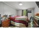 Cozy bedroom with a window and dresser at 5128 Green Leaf Ct, Mount Holly, NC 28120