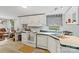 Efficient kitchen featuring essential appliances and practical counter space, plus natural light at 5128 Green Leaf Ct, Mount Holly, NC 28120