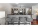 Stylish kitchen with bar seating, stainless steel appliances, and contemporary lighting at 529 N Graham St # 2G, Charlotte, NC 28202