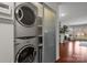 Laundry closet with stackable washer and dryer at 529 N Graham St # 2G, Charlotte, NC 28202