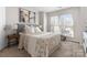 Bright main bedroom with neutral tones, carpet floors, and large windows at 529 N Graham St # 2G, Charlotte, NC 28202