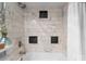 Elegant bathroom featuring a tiled shower, and contemporary fixtures at 529 N Graham St # 2G, Charlotte, NC 28202