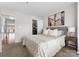 Bright bedroom with neutral tones, a comfortable bed, and a walk-in closet at 529 N Graham St, Charlotte, NC 28202