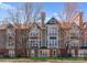 Building facade with prominent windows and well maintained landscape at 529 N Graham St # 2G, Charlotte, NC 28202