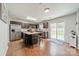 Well-equipped kitchen with a center island, stainless steel appliances, and hardwood floors at 5306 Graypark Dr, Charlotte, NC 28269