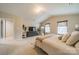 Sunlit main bedroom showcasing light walls, plush carpet, and two windows offering natural light at 5306 Graypark Dr, Charlotte, NC 28269