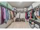 Organized walk-in closet with shelving, racks, and shoe storage, offering plenty of space for storage at 5306 Graypark Dr, Charlotte, NC 28269