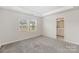 Bright bedroom with carpet, windows and an ensuite bathroom at 5532 Axil Ln, Charlotte, NC 28269