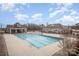 Large community pool with a covered seating area, great for recreation and socializing at 5532 Axil Ln, Charlotte, NC 28269