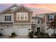 Charming townhome with a single-car garage, landscaped yard, and craftsman-style design at 5532 Axil Ln, Charlotte, NC 28269