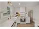 Charming kitchen with quartz countertops, stainless steel appliances, and natural light from the window at 6215 Coatbridge Ln, Charlotte, NC 28212