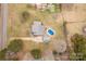 Aerial view of a single Gathering home with a pool and detached garage on a large lot at 705 Tirzah Rd, York, SC 29745