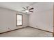 Cozy bedroom featuring neutral walls, carpet, window with blinds, and a ceiling fan with light at 705 Tirzah Rd, York, SC 29745