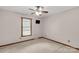 Cozy bedroom with neutral decor, ceiling fan and ample natural light at 705 Tirzah Rd, York, SC 29745