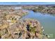 Aerial view of lake with multiple properties and private docks at 7262 Right Angle St, Sherrills Ford, NC 28673