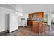 Traditional kitchen features tile floors, backsplash, and wooden cabinets at 7262 Right Angle St, Sherrills Ford, NC 28673