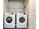 A laundry room features a newer washer and dryer at 8247 Pozzi Rd, Charlotte, NC 28216