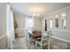 Dining room is bright and features wood-look floors and a neutral color scheme at 9613 Central Dr, Mint Hill, NC 28227