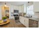 Beautiful kitchen with stainless steel appliances and sleek countertops at 9613 Central Dr, Mint Hill, NC 28227