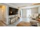 Living room features wood floors and a decorative console table to the left at 9613 Central Dr, Mint Hill, NC 28227