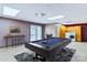 A basement featuring a pool table, bar, and laundry appliances, creating a versatile recreation space at 1109 Hemlock Dr, Shelby, NC 28150