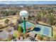 Aerial view of tennis courts and Tega Cay Water Tower, providing recreational amenities and essential services at 11122 Windgate Ct, Tega Cay, SC 29708