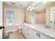 Bathroom with double sinks, granite countertops, a large mirror, and wood-look tile flooring at 11122 Windgate Ct, Tega Cay, SC 29708