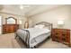 Spacious bedroom with carpet floors, traditional furniture and natural light from windows at 11122 Windgate Ct, Tega Cay, SC 29708