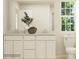 Bathroom featuring double sinks, with a view from the window and modern finishes at 1197 Blackburn Cir, Edgemoor, SC 29712