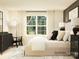 Bright bedroom featuring a large window, black furniture and coordinated decor on a rug at 1197 Blackburn Cir, Edgemoor, SC 29712