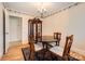 Traditional dining room showcasing hardwood floors, chandelier and built in cabinet at 12 Roberta Rd, Concord, NC 28027