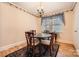 Traditional dining room with hardwood floors and a classic chandelier at 12 Roberta Rd, Concord, NC 28027