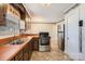 Well-lit kitchen with ample counter space and stainless steel appliances at 12 Roberta Rd, Concord, NC 28027