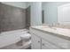 Bathroom featuring a tub and shower combination and granite vanity at 12432 Bradford Park Dr, Davidson, NC 28036