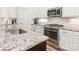 Bright kitchen featuring stainless steel appliances and granite countertops at 12432 Bradford Park Dr, Davidson, NC 28036