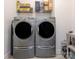 Laundry room featuring large washer and dryer appliances at 12432 Bradford Park Dr, Davidson, NC 28036